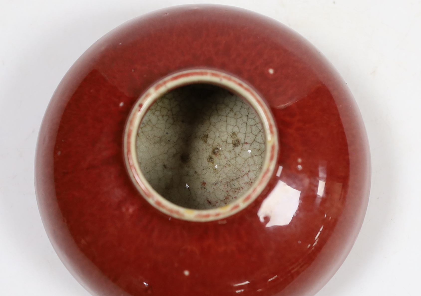 A Chinese sang de boeuf glazed water pot, 12cm diameter